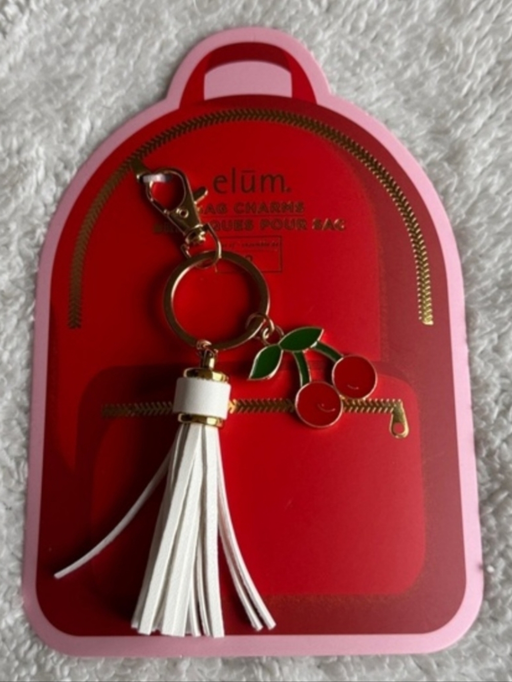 Elūm White Tassel & Cherry Enamel Keychain